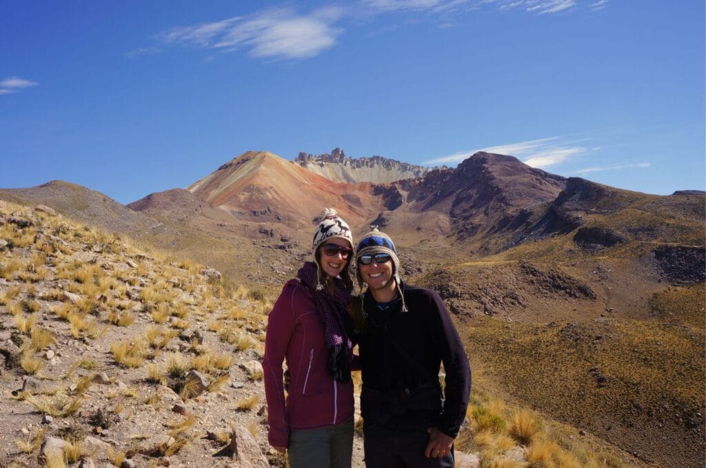 Fabienne and Benoit in front of the Tunupa volcano in Bolivia